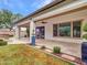 Expansive backyard features a covered patio, lush lawn, and beautifully landscaped areas for outdoor enjoyment at 3809 E Lynx Pl, Chandler, AZ 85249