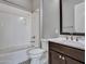 Bathroom featuring a shower and tub combo, toilet, and vanity with sink at 3809 E Lynx Pl, Chandler, AZ 85249