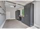 Spacious garage with plenty of storage cabinets, workspace, and bright lighting at 3809 E Lynx Pl, Chandler, AZ 85249