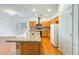 Kitchen showcases granite counters, wood cabinets, and stainless steel appliances at 38125 W Santa Clara Ave, Maricopa, AZ 85138