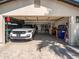 Clean garage with epoxy floors, ample storage and shelving at 5919 S Newberry Rd, Tempe, AZ 85283