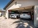 Spacious garage with epoxy floors, ample storage, and room for multiple vehicles at 5919 S Newberry Rd, Tempe, AZ 85283
