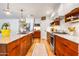 Well-equipped kitchen with large center island and state of the art appliances at 5919 S Newberry Rd, Tempe, AZ 85283