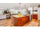 Modern kitchen island with a sink and stainless steel dishwasher at 5919 S Newberry Rd, Tempe, AZ 85283