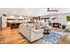 Open floor plan with cozy fireplace, living room, kitchen, and modern decor at 5919 S Newberry Rd, Tempe, AZ 85283