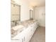 Bright bathroom with double sinks, granite countertops, and tile flooring at 5998 N 78Th St # 222, Scottsdale, AZ 85250