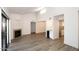 Open-concept living room featuring a fireplace and sliding glass doors to a balcony at 5998 N 78Th St # 222, Scottsdale, AZ 85250
