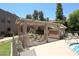 A covered patio area features comfortable seating and is perfect for relaxing or entertaining at 5998 N 78Th St # 222, Scottsdale, AZ 85250