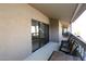 Relax on this covered patio with furniture, accessible through sliding glass doors at 5998 N 78Th St # 222, Scottsdale, AZ 85250