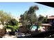 View of the pool and barbeque area from an upper level balcony at 5998 N 78Th St # 222, Scottsdale, AZ 85250
