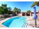Enjoy this beautiful pool on a sunny day, featuring a shallow end and BBQ area at 5998 N 78Th St # 222, Scottsdale, AZ 85250