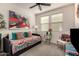 Neutral bedroom with a colorful daybed and decor at 805 E La Palta St, Queen Creek, AZ 85140