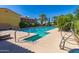 Inviting community lap pool with clear blue water and a relaxing lounge area, perfect for residents at 805 E La Palta St, Queen Creek, AZ 85140