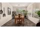 Cozy dining room with natural light and neutral color palette and seating for four at 805 E La Palta St, Queen Creek, AZ 85140