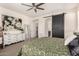 Comfortable main bedroom with plush carpet, ensuite bath, and plenty of natural light at 805 E La Palta St, Queen Creek, AZ 85140