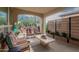 Outdoor patio featuring ample seating, a modern aesthetic, and a view of the yard at 805 E La Palta St, Queen Creek, AZ 85140
