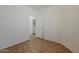 Bedroom featuring tile flooring, neutral paint, and access to a closet at 8733 W Laurel Ln, Peoria, AZ 85345