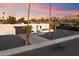 Charming exterior of a home with desert landscaping, showcasing a unique curb appeal at 10245 N 34Th Pl, Phoenix, AZ 85028