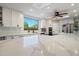 Bright kitchen featuring a large island, herringbone backsplash, and stainless steel appliances at 10245 N 34Th Pl, Phoenix, AZ 85028