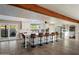 Spacious kitchen with an island and counter-height seating, perfect for dining and entertaining at 10245 N 34Th Pl, Phoenix, AZ 85028