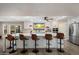 The spacious kitchen has a large central island, stainless appliances and a great view to the backyard at 10245 N 34Th Pl, Phoenix, AZ 85028