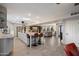 Spacious open kitchen with a large island, stainless steel appliances, and wood-look tile flooring throughout at 10245 N 34Th Pl, Phoenix, AZ 85028