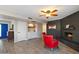 Living area with a brick fireplace, a built-in bar, and neutral tones at 10245 N 34Th Pl, Phoenix, AZ 85028
