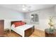 Cozy bedroom with wood flooring and neutral tones at 1445 W Wood Dr, Phoenix, AZ 85029