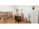 Functional office space featuring a desk and ample storage at 1445 W Wood Dr, Phoenix, AZ 85029