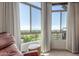 Bedroom featuring an oversized window with amazing golf course views at 15802 N 71St St # 657, Scottsdale, AZ 85254