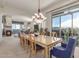 Elegant dining room featuring a large table and balcony access for scenic dining at 15802 N 71St St # 657, Scottsdale, AZ 85254