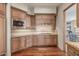 Well-equipped kitchen with stainless steel appliances and custom cabinets at 15802 N 71St St # 657, Scottsdale, AZ 85254