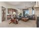 Spacious living room featuring a wet bar and comfortable seating with great views at 15802 N 71St St # 657, Scottsdale, AZ 85254