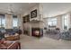 Bright and spacious living room with fireplace and beautiful built-in bookshelves at 15802 N 71St St # 657, Scottsdale, AZ 85254