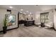 This lobby features comfortable chairs, stylish planters, contemporary artwork, and a front desk at 15802 N 71St St # 657, Scottsdale, AZ 85254