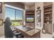 Office with a great view, built in shelves, and a display TV at 15802 N 71St St # 657, Scottsdale, AZ 85254