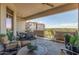 Spacious patio with comfortable seating, great golf course and mountain views at 15802 N 71St St # 657, Scottsdale, AZ 85254