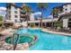 Inviting swimming pool with hot tub and lounge chairs at 15802 N 71St St # 657, Scottsdale, AZ 85254