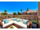 Inviting balcony featuring comfortable lounge seating with view of neighborhood rooftops at 1633 E Lakeside Dr # 143, Gilbert, AZ 85234