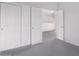 Spacious bedroom with closet storage and an open doorway to the rest of the home at 1633 E Lakeside Dr # 143, Gilbert, AZ 85234