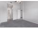 Bright bedroom boasts neutral walls, ceiling fan, and an ensuite bathroom for added convenience at 1633 E Lakeside Dr # 143, Gilbert, AZ 85234
