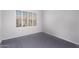 Comfortable bedroom features shuttered windows allowing natural light to illuminate the space at 1633 E Lakeside Dr # 143, Gilbert, AZ 85234