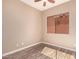 Cozy bedroom featuring natural light, ceiling fan, and stylish flooring at 16837 W Northampton Rd, Surprise, AZ 85374