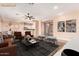 Open concept kitchen and dining area create a modern living space at 16837 W Northampton Rd, Surprise, AZ 85374