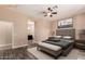 Comfortable main bedroom with attached bathroom offering a private retreat at 16837 W Northampton Rd, Surprise, AZ 85374