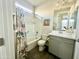 Bright bathroom featuring a bathtub and shower combo, tiled floors, and vanity sink at 18100 N Piccolo Dr, Maricopa, AZ 85138