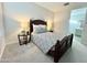 Well-lit bedroom with a bed and side tables, offering a serene and inviting retreat at 18100 N Piccolo Dr, Maricopa, AZ 85138