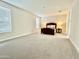 Spacious bedroom with large windows, neutral walls, and soft carpeting creating a comfortable retreat at 18100 N Piccolo Dr, Maricopa, AZ 85138