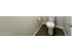 Bathroom featuring elongated toilet, ceramic tile floor and neutral walls at 18100 N Piccolo Dr, Maricopa, AZ 85138