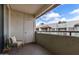 Private balcony overlooking a community with comfortable seating and scenic views at 1825 W Ray Rd # 2132, Chandler, AZ 85224